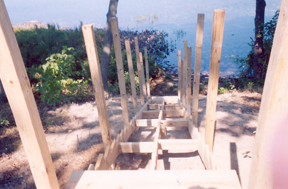 Framing for permanent staircase leading down to beach